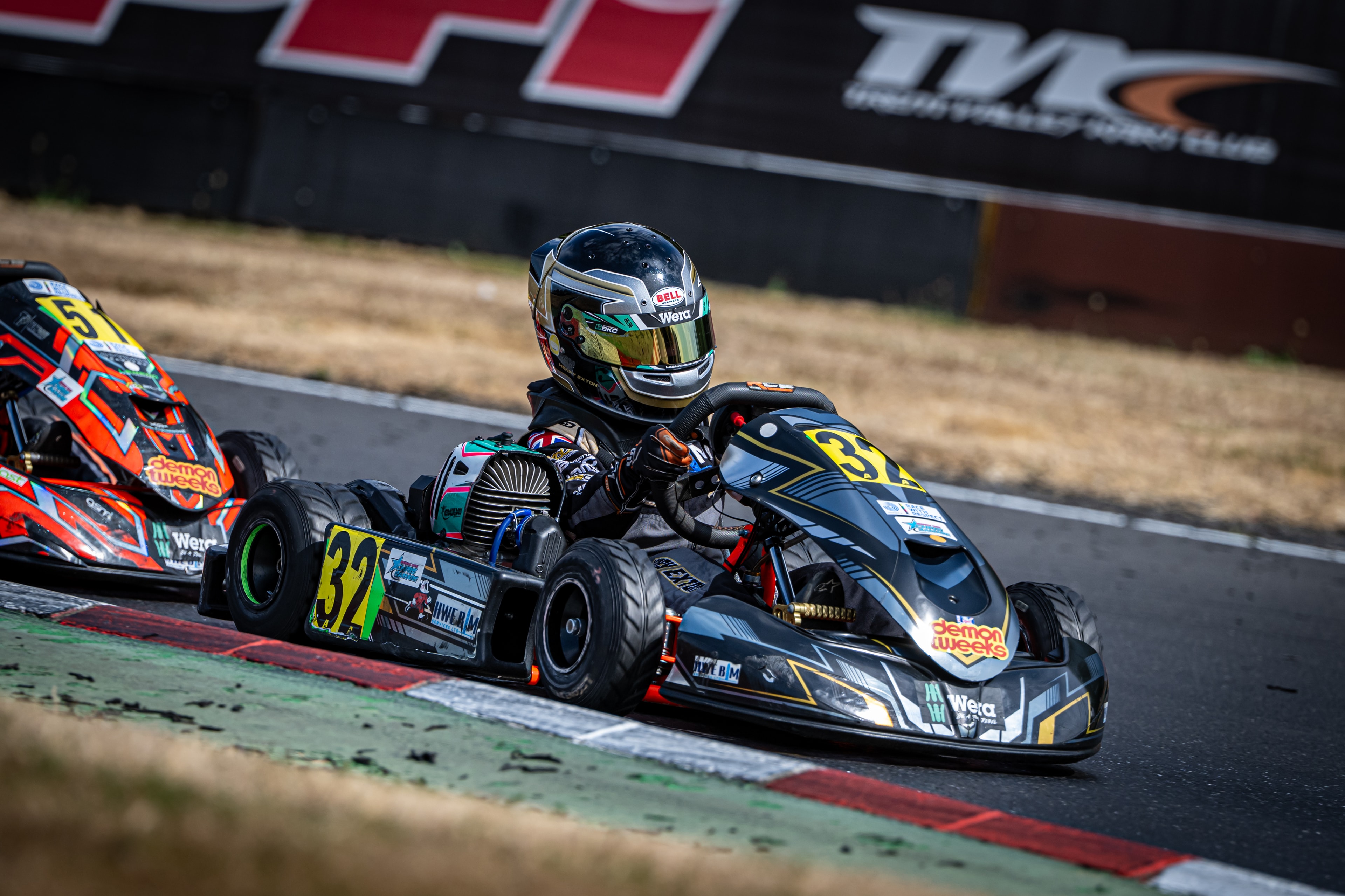 Henry Exton kart number 32 in battle at PFI
