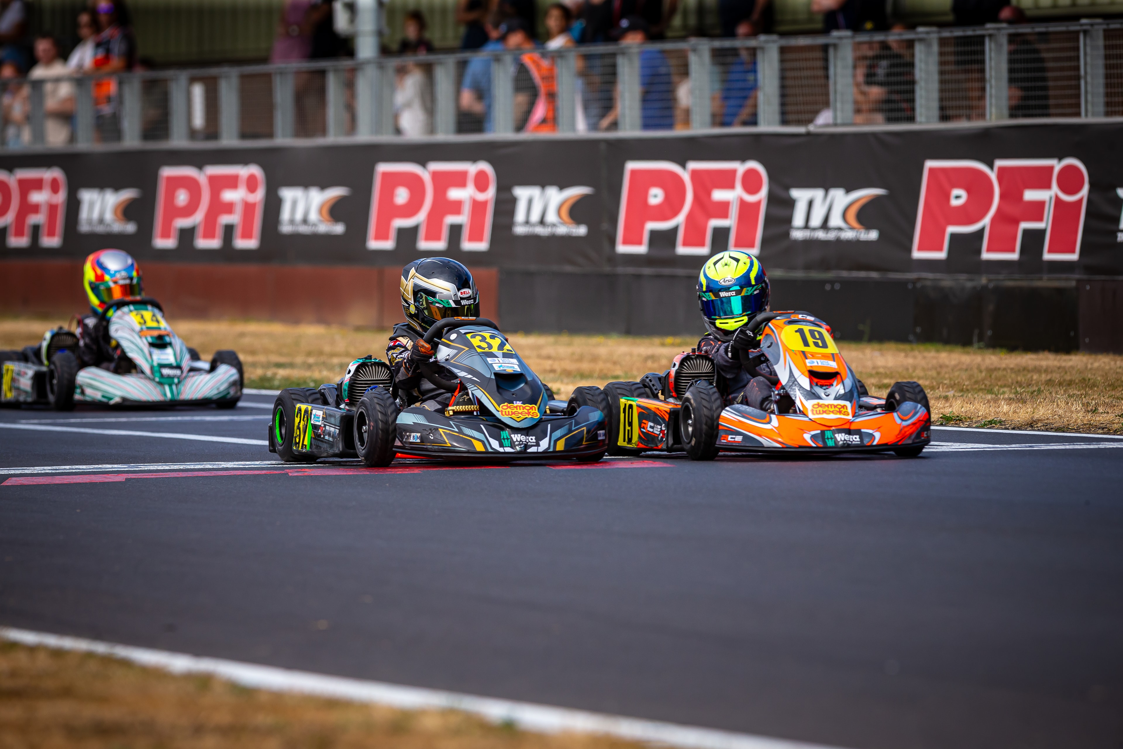 Henry Exton kart number 32 in close battle at PFI