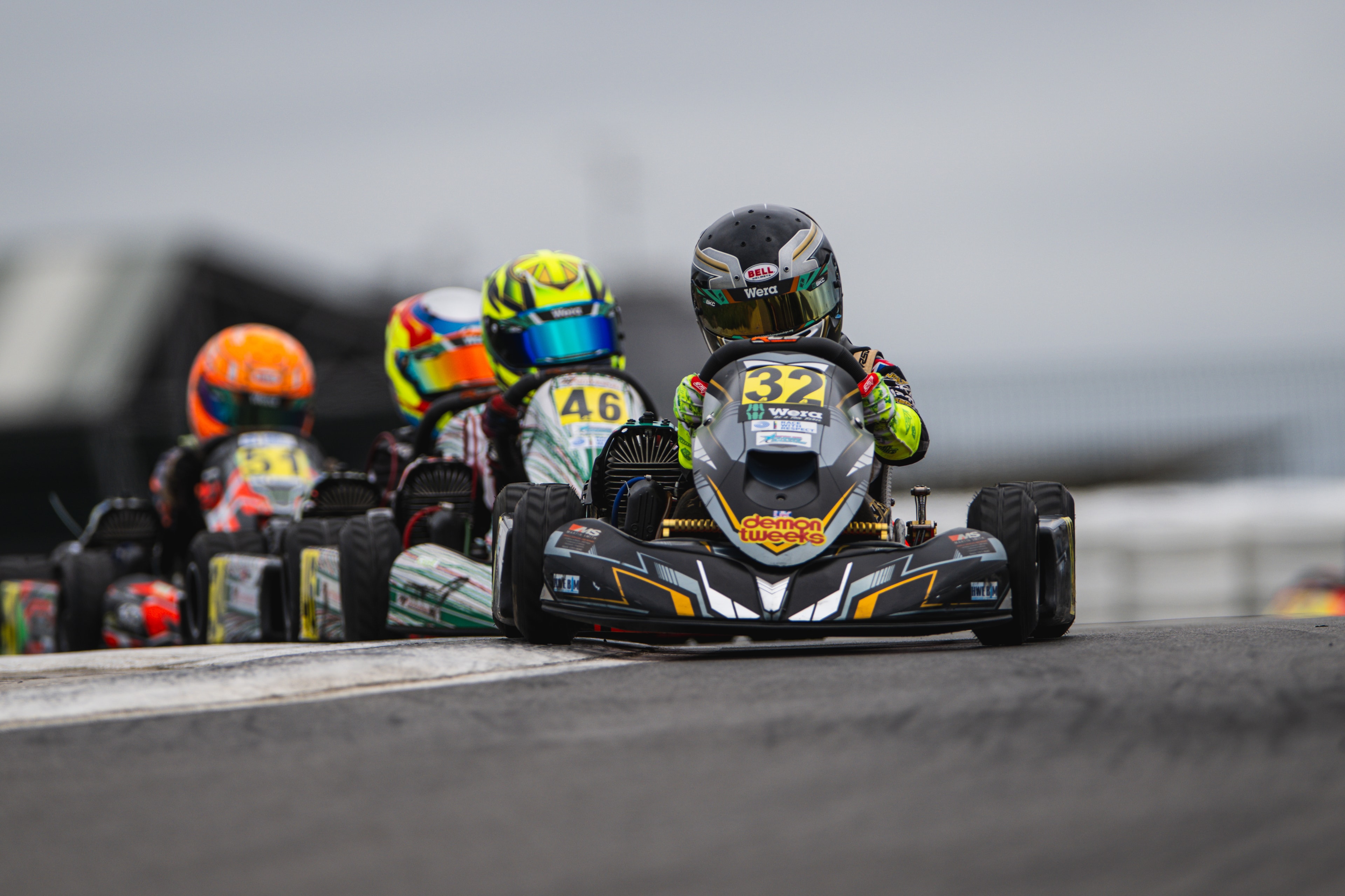 Henry Exton kart number 32 in close battle at Silverstone